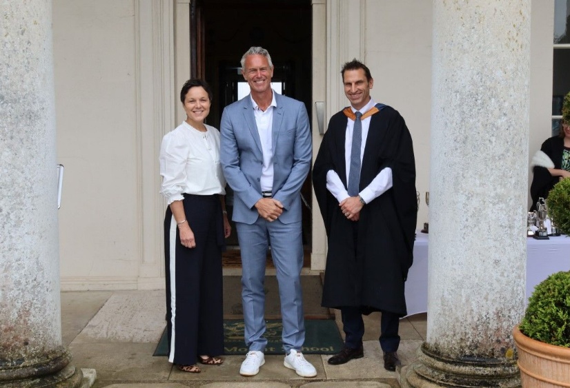 Chair of Governors Juliette Hodson, Mark Foster and Chris Gillam pose outside the Grade I listed mansion house on Speech Day